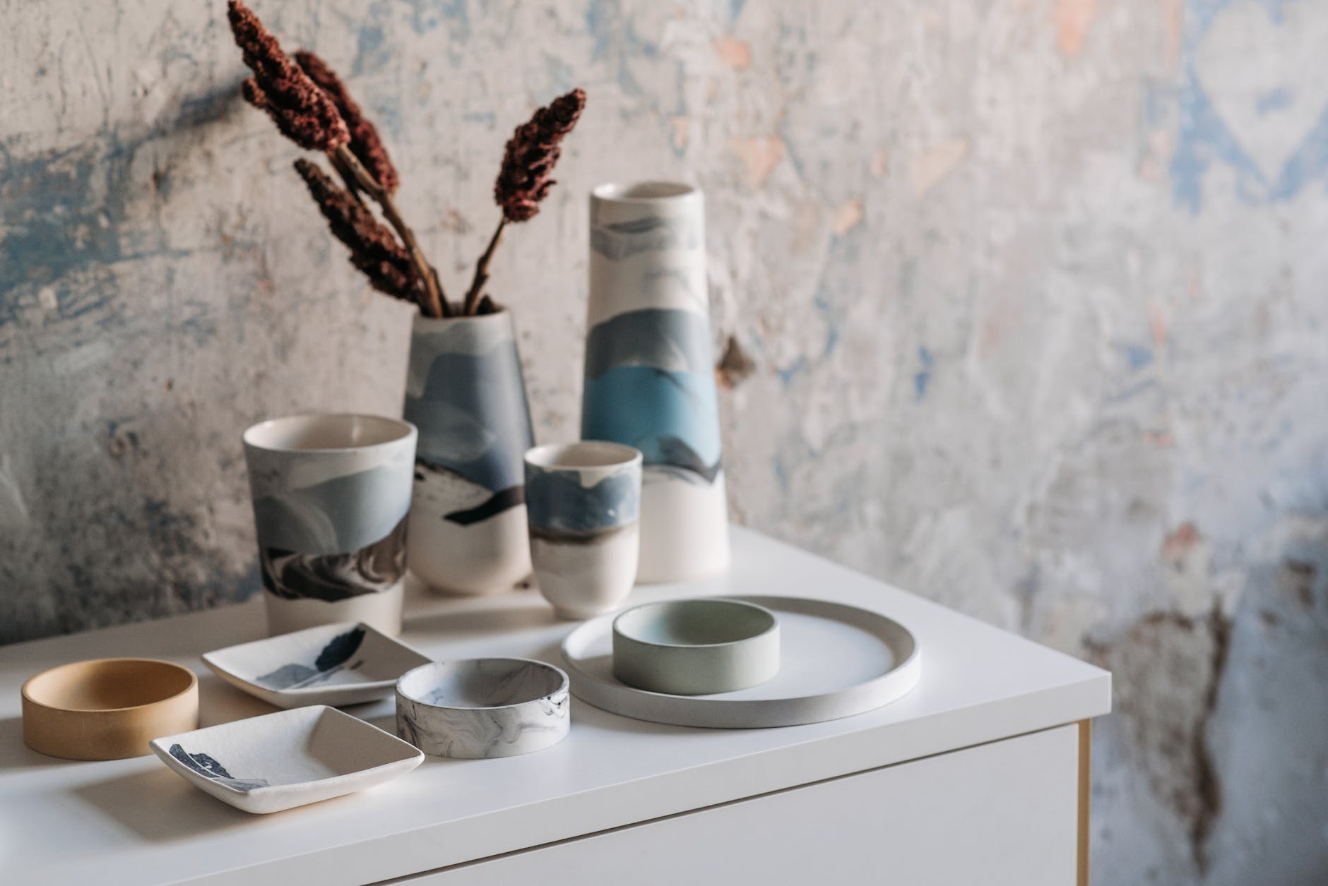 earthenware products on white table